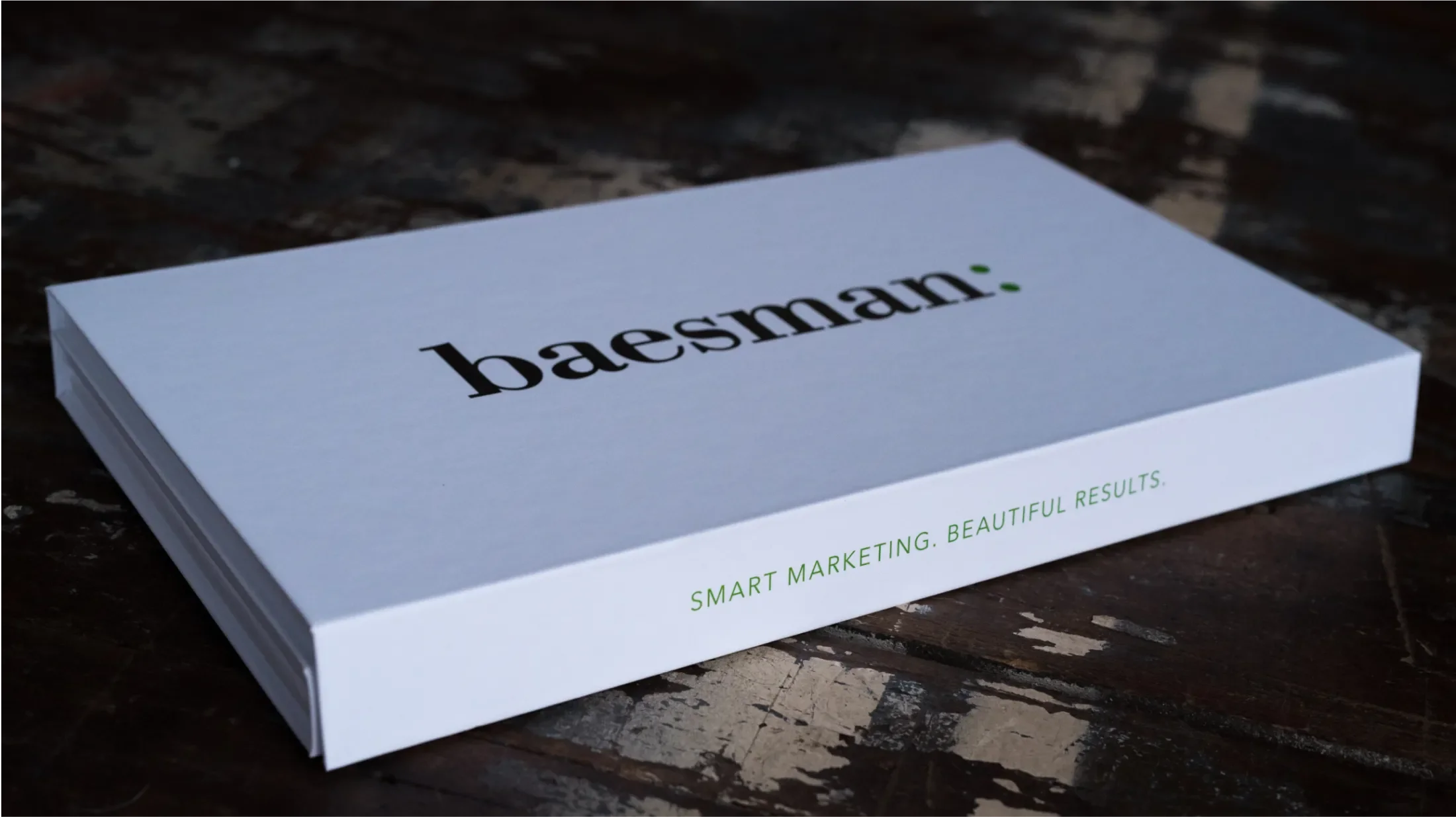 Image of a box holding some print advertising for Baesman