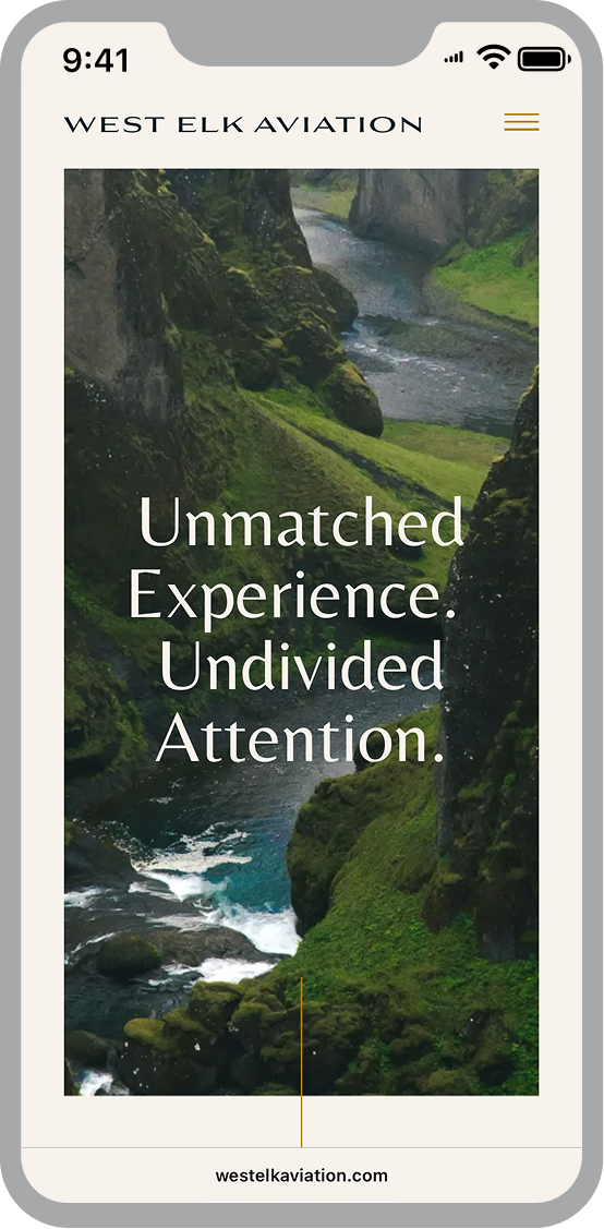 Mobile view of the West Elk Aviation website featuring a caption against a lush green mountainous backdrop which reads "Unmatched Experience Undivided Attention"