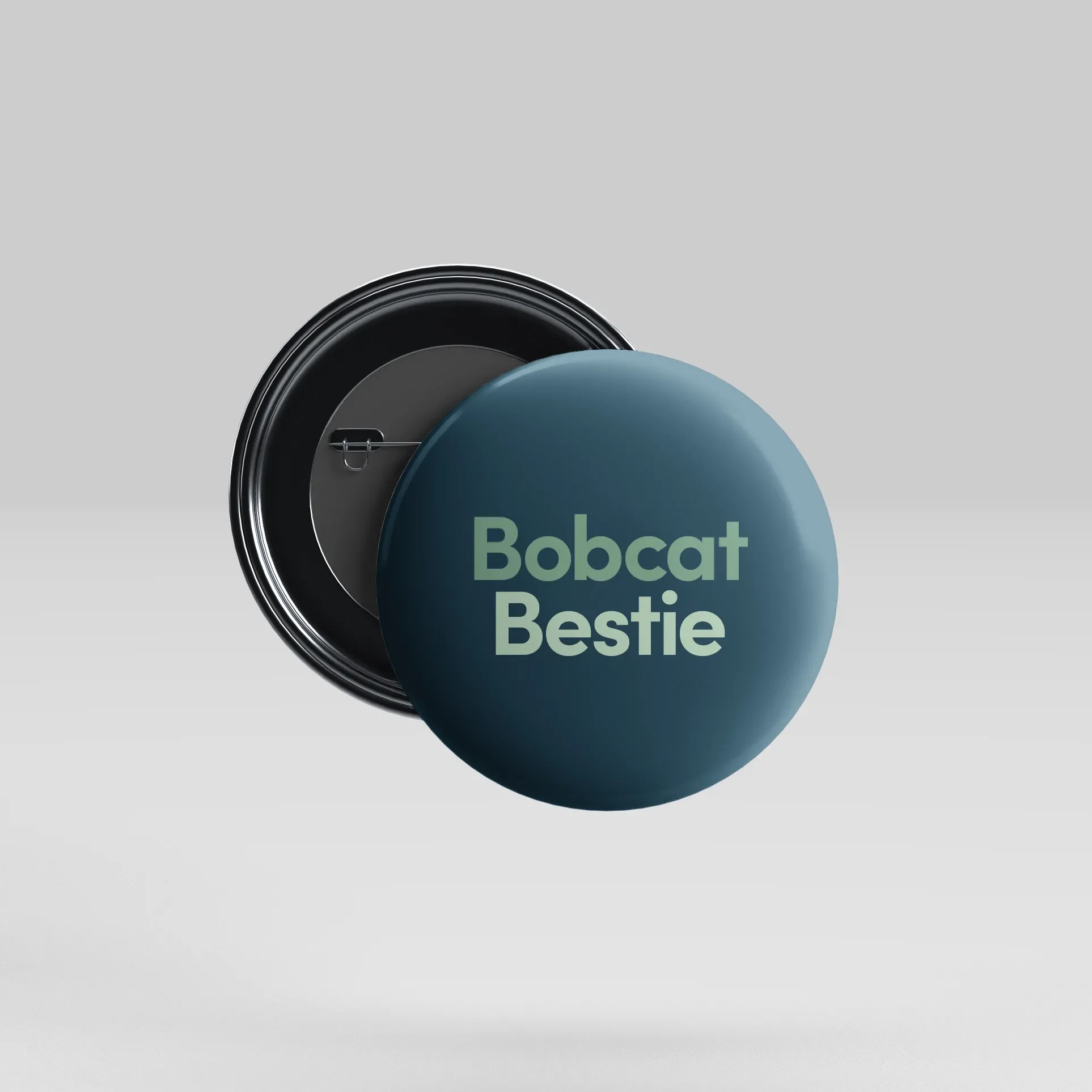 maymont button that says bobcat bestie