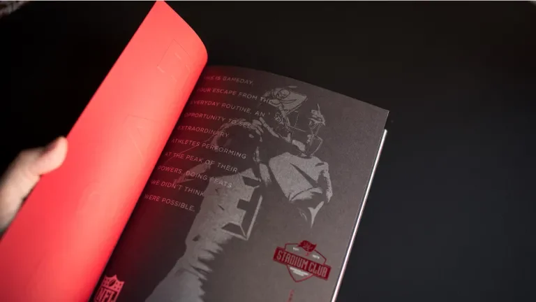 Cover of East Club reveals inspirational message, printed silver on metallic paper