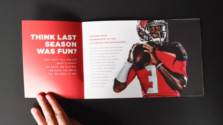 Season pass brochure inside spread