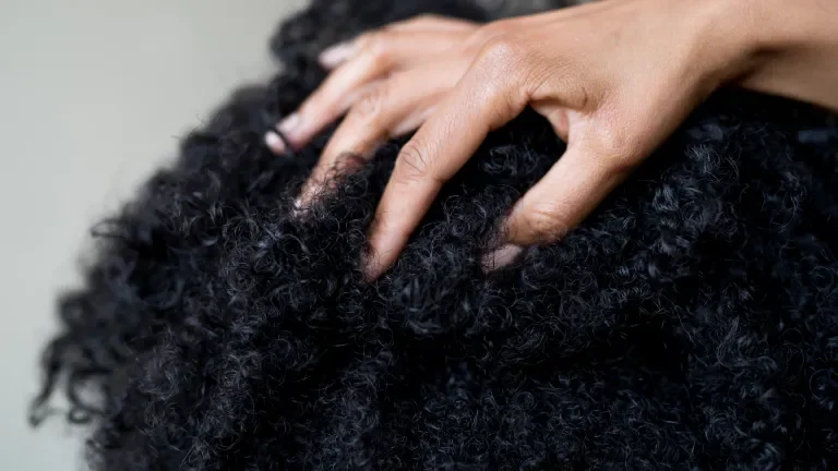 woman running hand through hair
