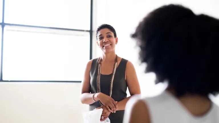 Dr. Shari Hicks-Graham smiling at the product actor
