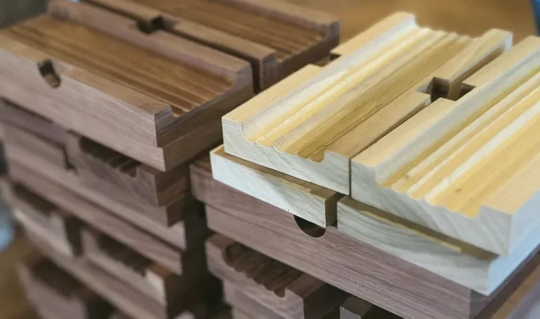 Close-up of both stained and unfinished pencil trays