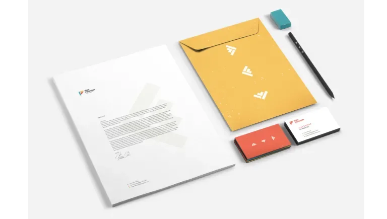 A branded pencil, envelope, letterhead and business cards 