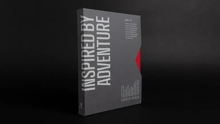 Outer sleeve of the desk calendar packaging which reads, "Inspired by Adventure"