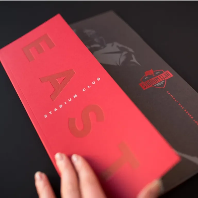 East Club cover flap with specialty papers, foils, debossment