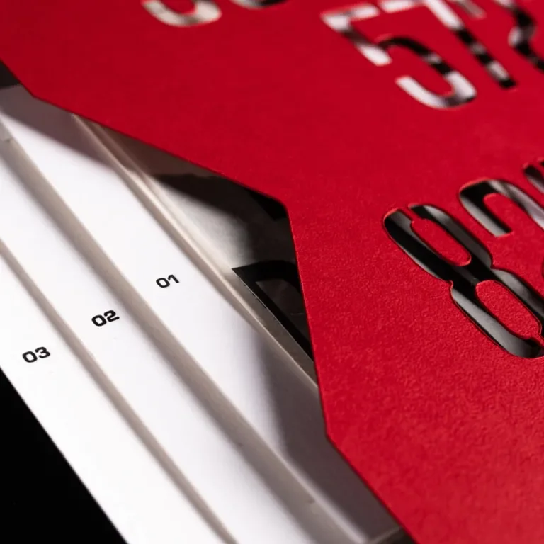 Close up of the calendar cards coming out of the inner sleeve, numbered 1-3