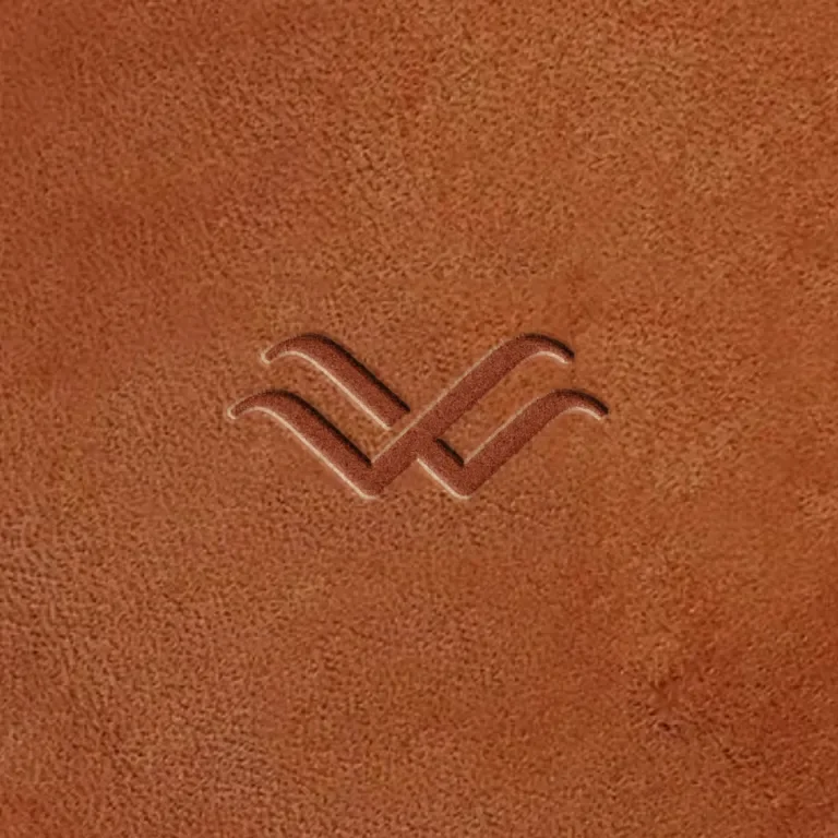 West Elk Aviation logomark debossed on leather