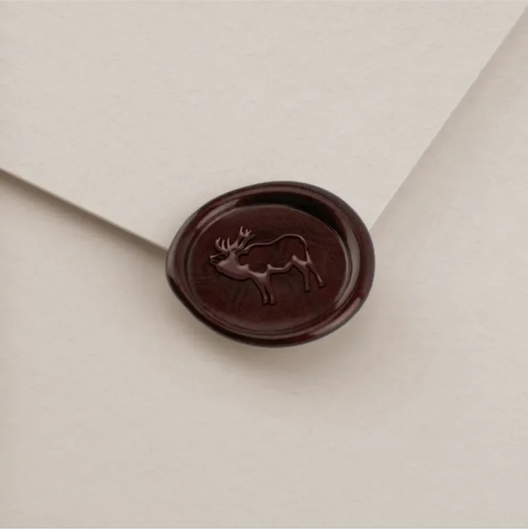 Envelope wax seal with an elk pressed into it
