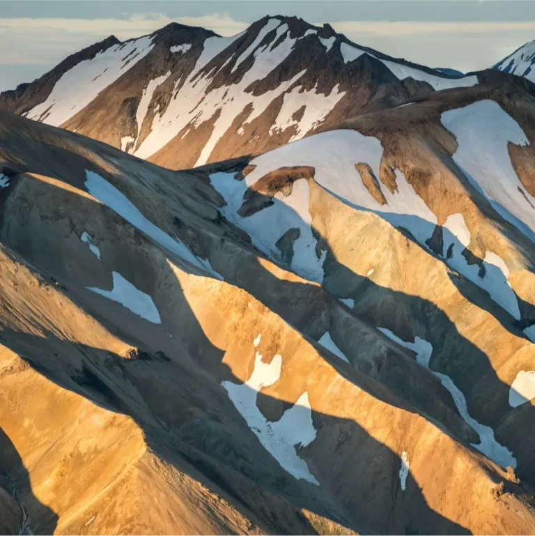 A sunlit mountainscape