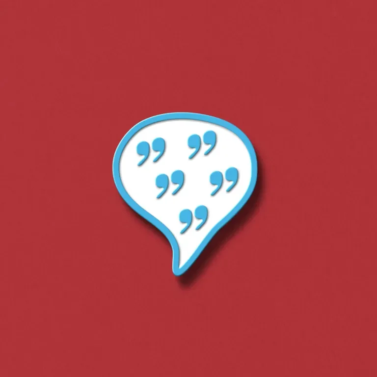 A blue and white enamel pin with quotation marks inside against a scarlet background