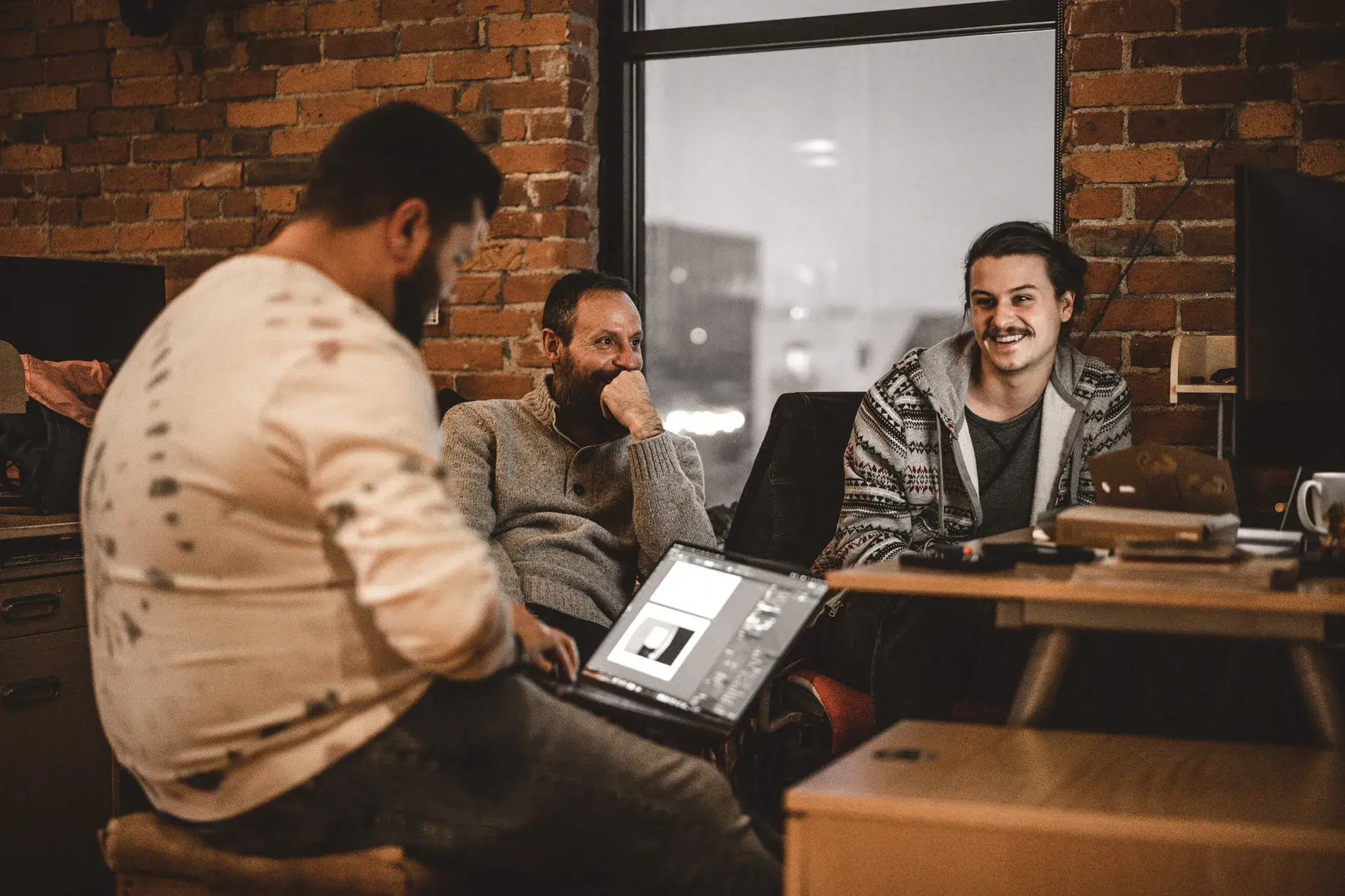 3 coworkers admiring how amazing the dev team is