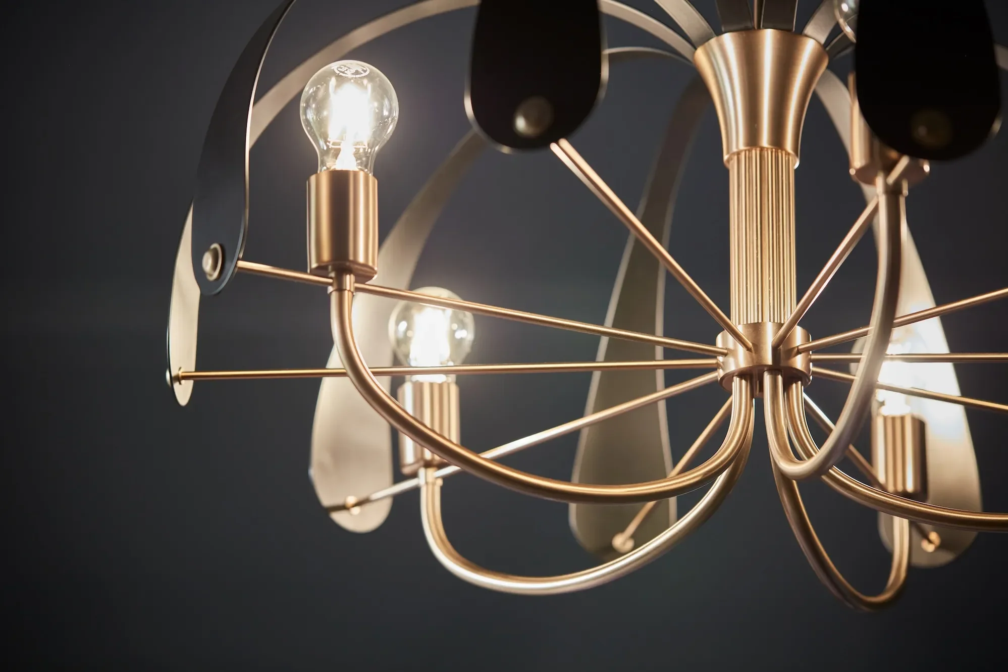 Close-up detail shot of a golden Kichler chandelier