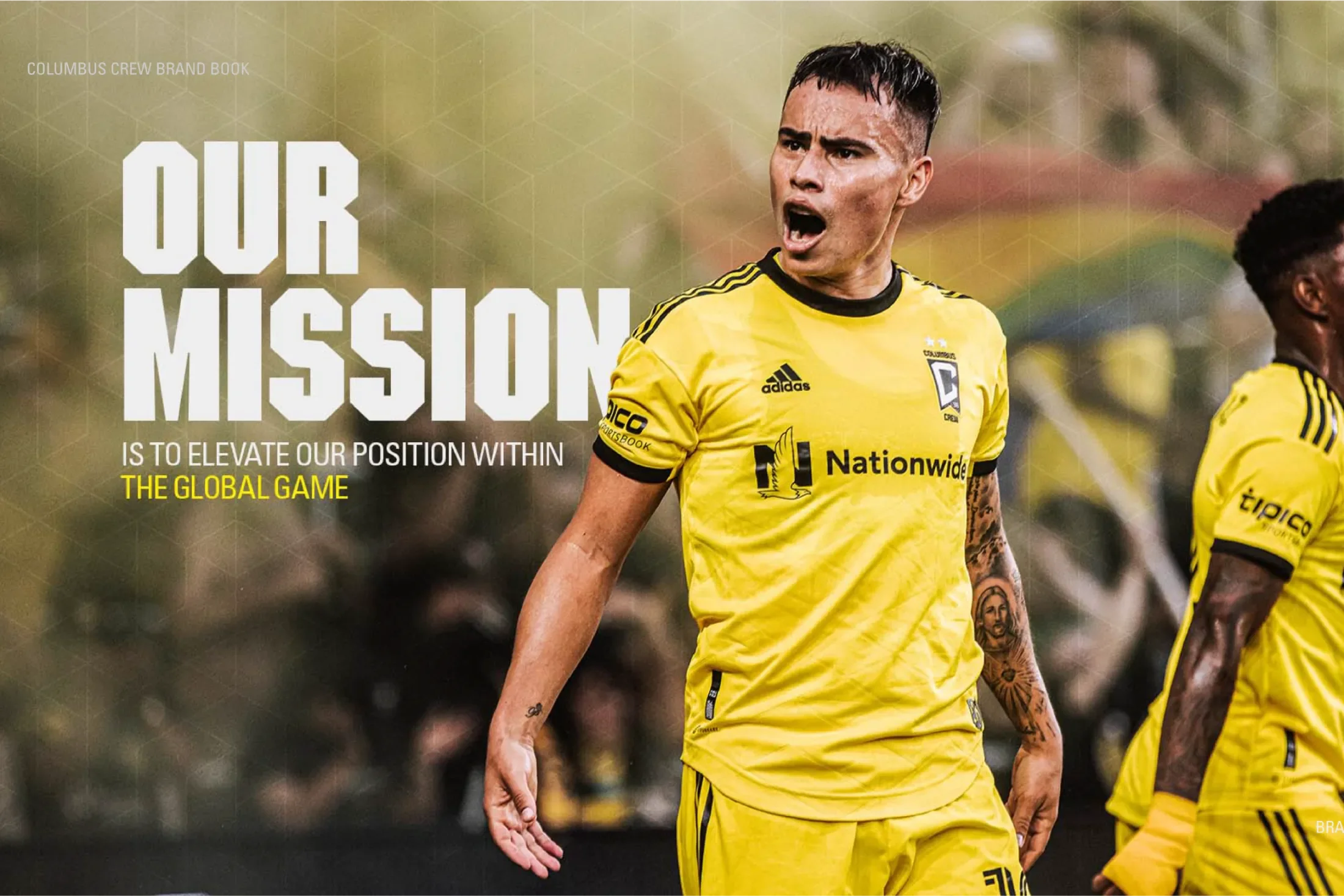 Two Columbus Crew players on the pitch during a game with the caption "Our mission is to elevate our position within the global game"