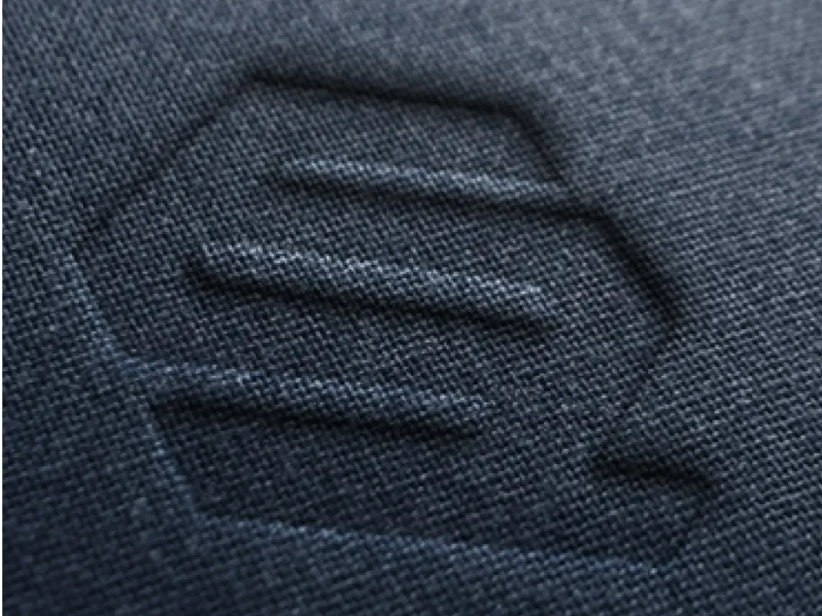 Debossed QS Partners logos