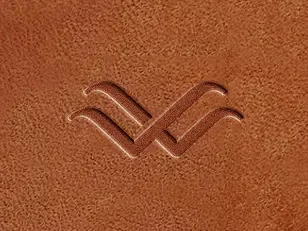 West Elk Aviation logomark debossed on leather
