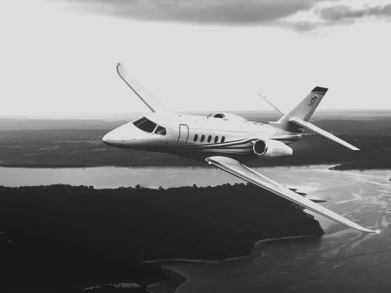 5x5 black and white image of Jet flying