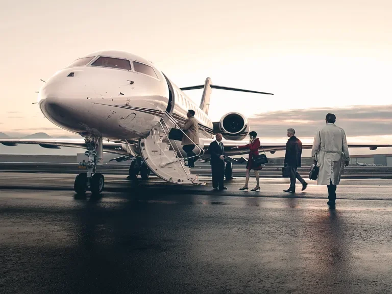 NetJets Jet on tarmac with clients boarding
